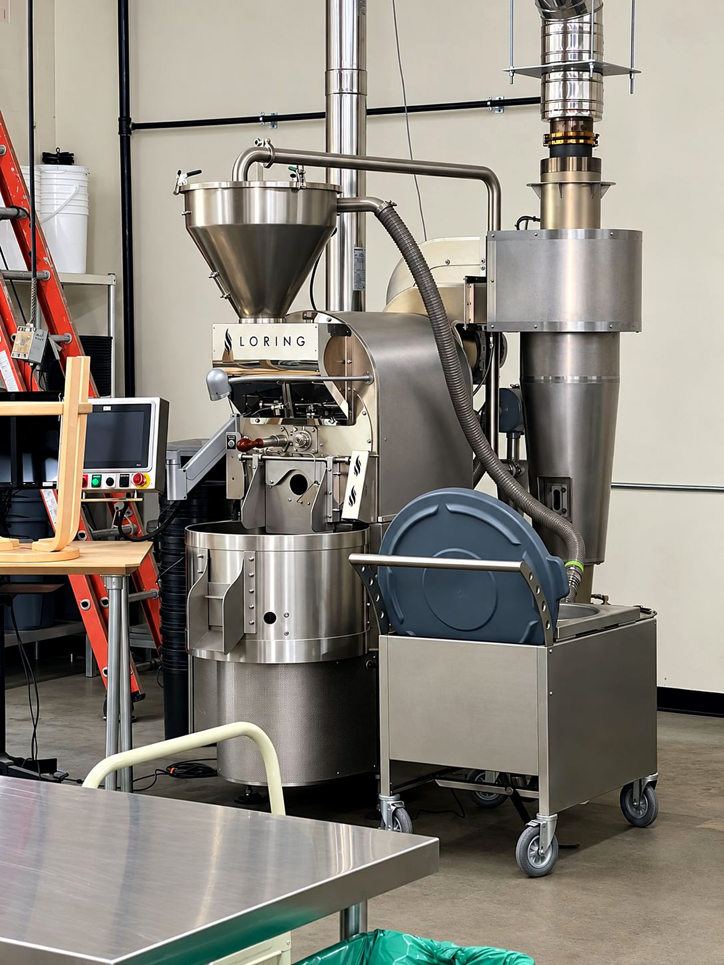A coffee roaster at the roastery